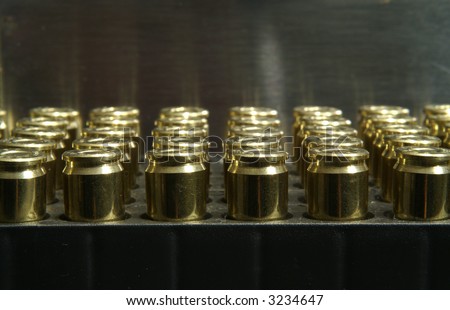 9mm bullets stacked in a plastic case