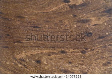 Wood background with knots and wavy texture