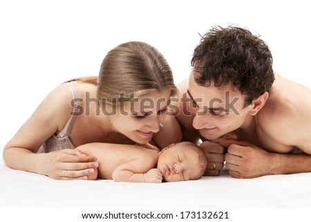 Young caucasian couple with one week old boy