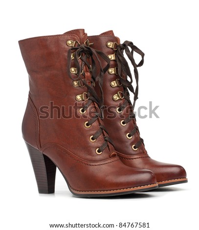 Similar – Image, Stock Photo Woman in brown boots standing on a wooden floor holding a dried artichoke flower in her hand