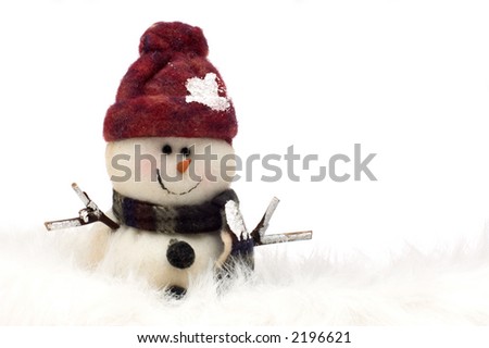 snowman standing in snow on white background