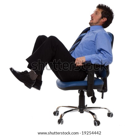 young business man moving on a chair isolated