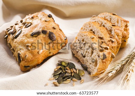 Fresh whole grain bread with seeds close up shoot