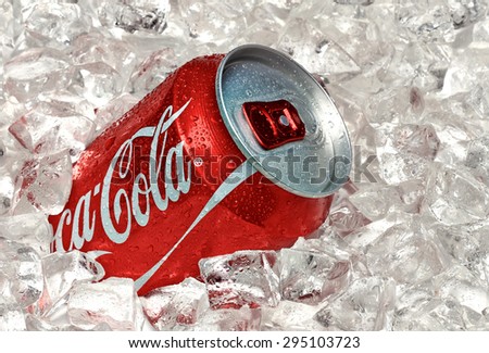 TURKEY - June 10, 2015: Classic Coca-Cola can with water drops in ice. \
Coca-Cola is one of the worlds favorite beverages.