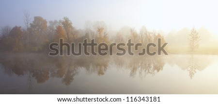 Misty Autumn Morning by Lakeside