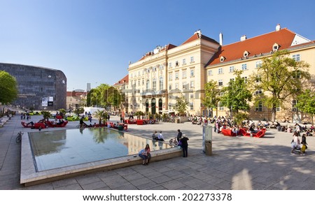 VIENNA, AUSTRIA - APRIL 19: Many people enjoy a sunny afternoon at the Museumsquartier on April 19, 2011 in Vienna. It is the eighth largest cultural area in the world and a very important for Vienna