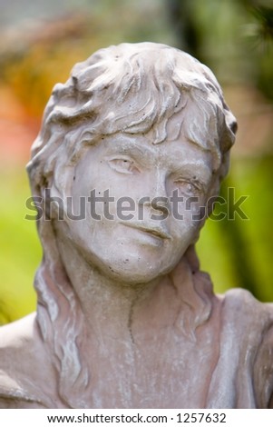 close up Stone girl stone garden statue
