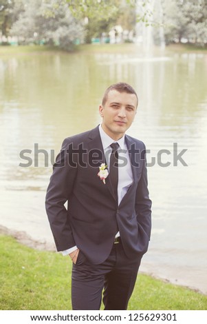 groom in stylish suit on the wedding day