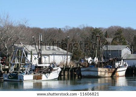 fishing boats getting cleaned up for the summertime