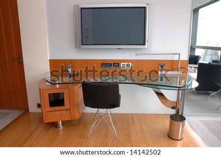 Work desk with plasma TV in a modern hotel room