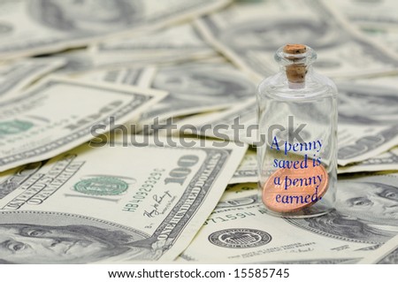 Apenny saved is a penny earned - penny in bottle over US 100 dollar bills