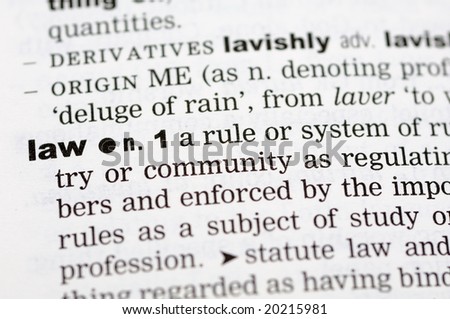 A close up of the word law from a dictionary