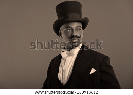 Retro afro american dickens scrooge man with mustache. Wearing black hat.