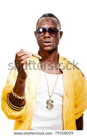 Studio portrait of cool black gangster rapper with yellow jacket, sunglasses and cigar. Isolated on white background.