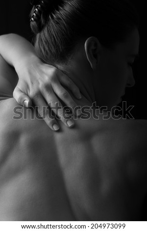 Body scape of woman back in low light with emotion artistic conversion
