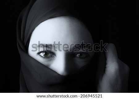 Middle Eastern woman portrait looking sad with a hijab artistic conversion