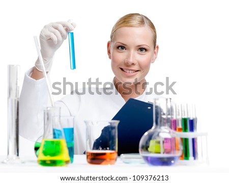 Medic researcher holds vial full of blue liquid, isolated on white