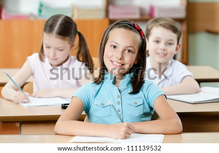 Pupils are are glad to study. They listen to every word of teacher
