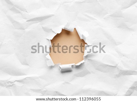 Milky circle shape breakthrough crumpled paper hole with white background