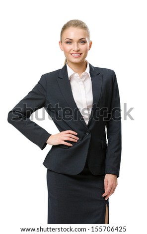 Half-length portrait of businesswoman with her hand on hip, isolated on white. Concept of leadership and success