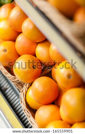 Top view of oranges in the shop. Concept of healthy food