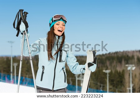 Half-length portrait of female downhill skier. Concept of winter sports and cute entertainment