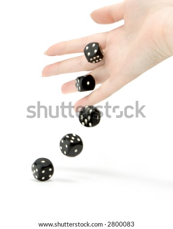 Throwing black gambling dices isolated on white