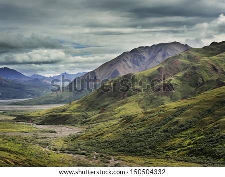 Mountain Landscape With A Cloudy Sky