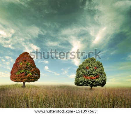 Two Trees On A Field With Happy And Unhappy Faces