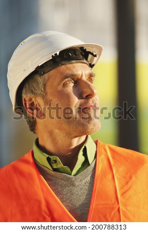 Germany, Hamburg, Close up of man in hard hat