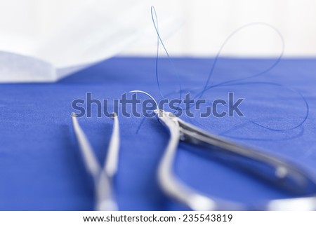 Sterile needle and needle holder