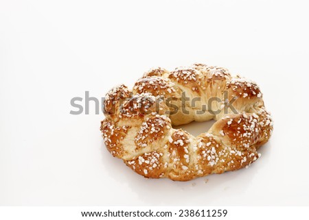 Plaited yeast wreath on white background, Ester pastry