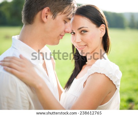 Beautyful young couple happy in nature