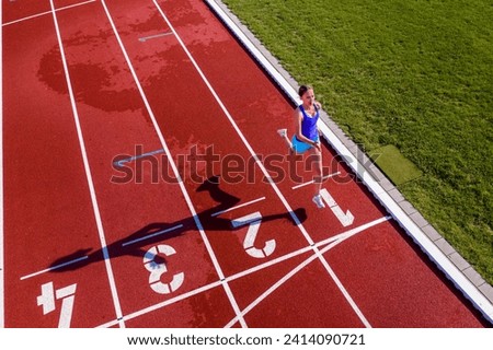 Similar – Image, Stock Photo Athletic woman running on paved street