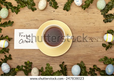 Easter decoration, coffee cup, card, Happy Easter on wood