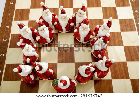 Group of Santa Clauses on chess board