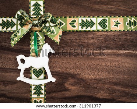Christmas, gift ribbon on wood, christmas decoration, rocking horse