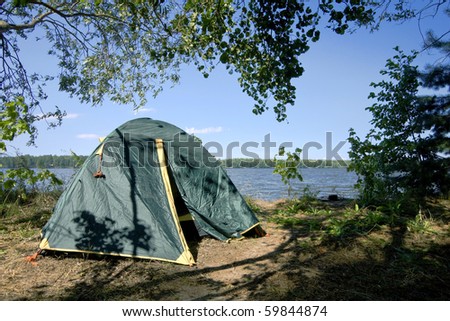 Camping in the forest near the big river.