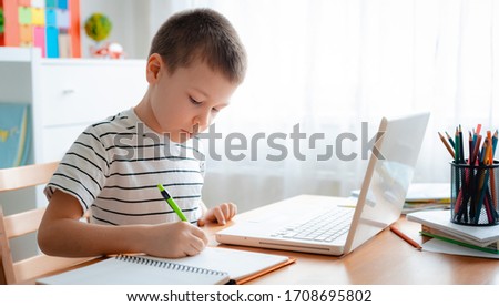 Similar – Image, Stock Photo Boy does homework