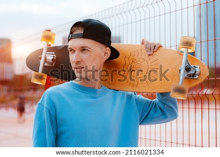 Similar – Image, Stock Photo Man riding skateboard on pump track