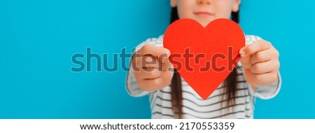 Similar – Image, Stock Photo girl holds a heart out of her hands