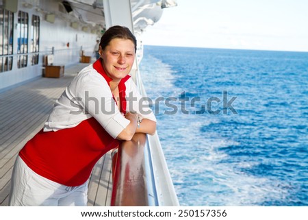 Happy woman on cruise ship