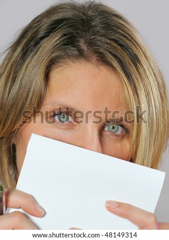 Pretty blonde woman with  block notes