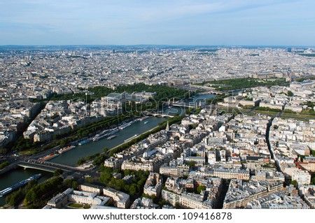 PARIS, FRANCE - MAY 28: Aerial view on river Seine and Paris from Eiffel tower on May 28, 2011, France. The Seine is a 776 km long river and an important tourist waterway within the Paris area