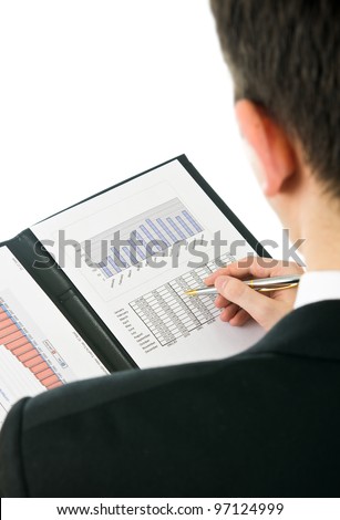 Businessman checking financial results from previous year.