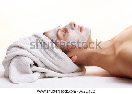 Woman relaxing with beauty mask.