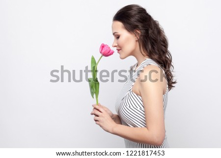 Similar – Image, Stock Photo Woman smells red tulips