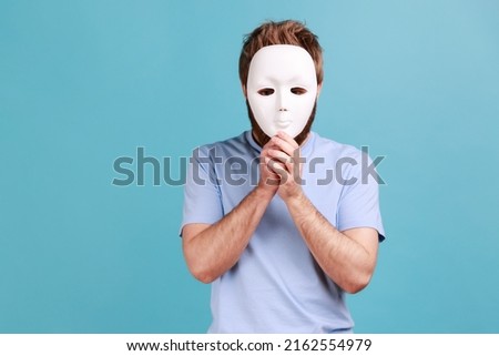 Similar – Image, Stock Photo Man covered his face with a breathing mask. Coronavirus, asthmatic and allergy concept. Artistic analog pinhole camera photography