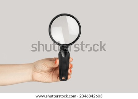 Similar – Image, Stock Photo Macro unknown hand giving terminal to visitor for mobile phone payment indoor. Client hand paying bill with smartphone in blurred background. Cropped shot hands making contactless transaction inside.