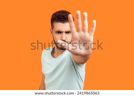 Similar – Image, Stock Photo Strict no stopping on a tree trunk overgrown with ivy in the sunshine in Oerlinghausen near Bielefeld in the Teutoburg Forest in East Westphalia-Lippe